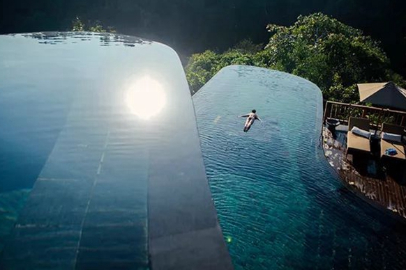看世界這些奇特的泳池 你敢來游一下麽?